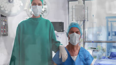 medical professionals in surgical attire with healthcare animation over hospital background
