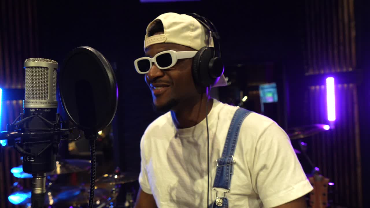 Musician recording in a studio