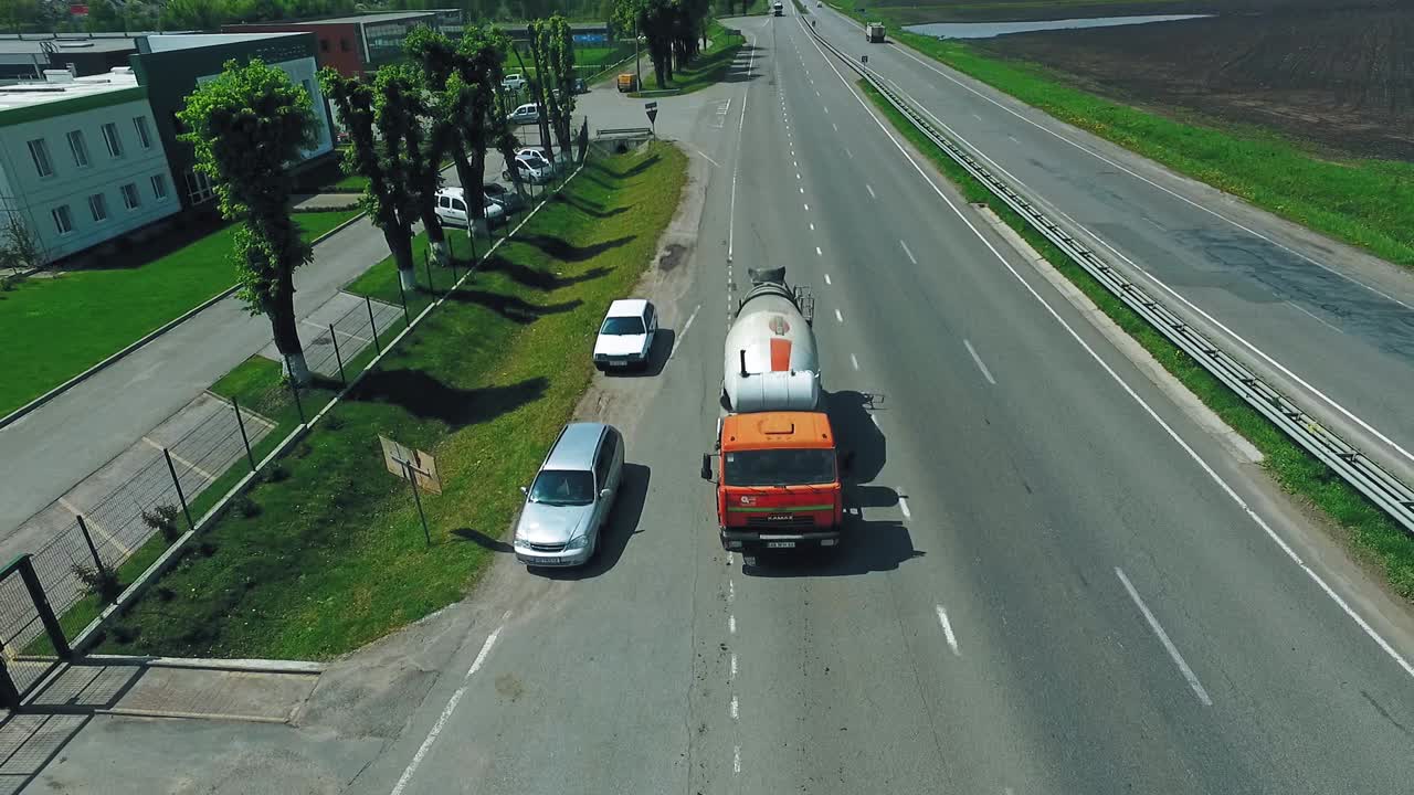 Concrete mixer with transport trucks. Concrete mixer truck on highway road