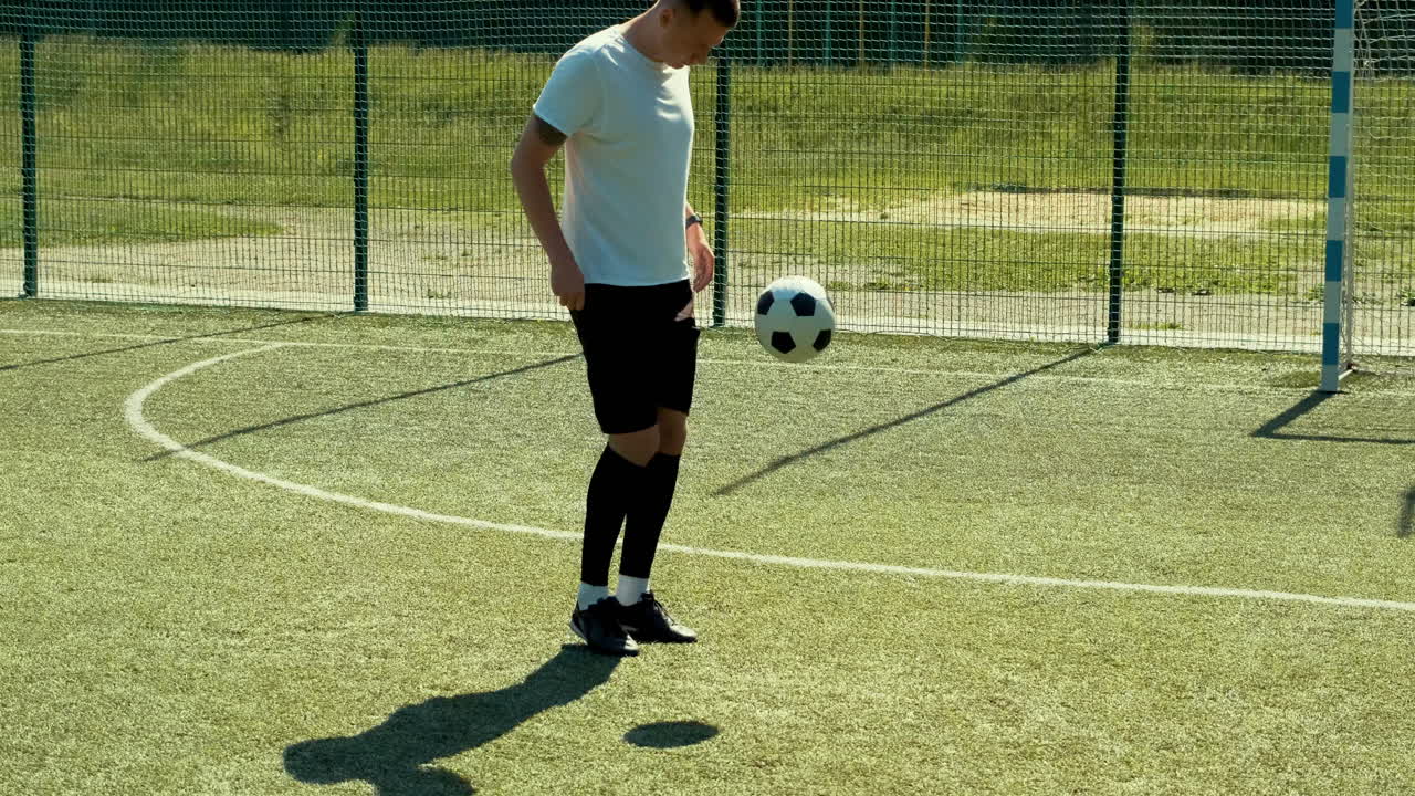 Young Attractive Guy In Denim Shirt With Laptop In His Hands Is Walking Somewhere In Well Lit Indoors Area, Fully Concentrated