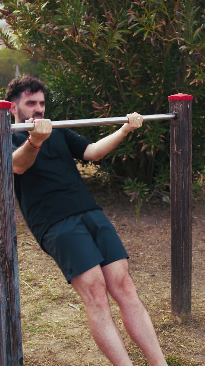 Effort Of An Athlete Training His Arms Outdoors At The Park