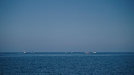 calm ocean with boats