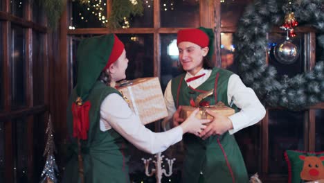 christmas elves exchanging presents