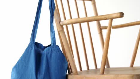 handbag hanging on a chair