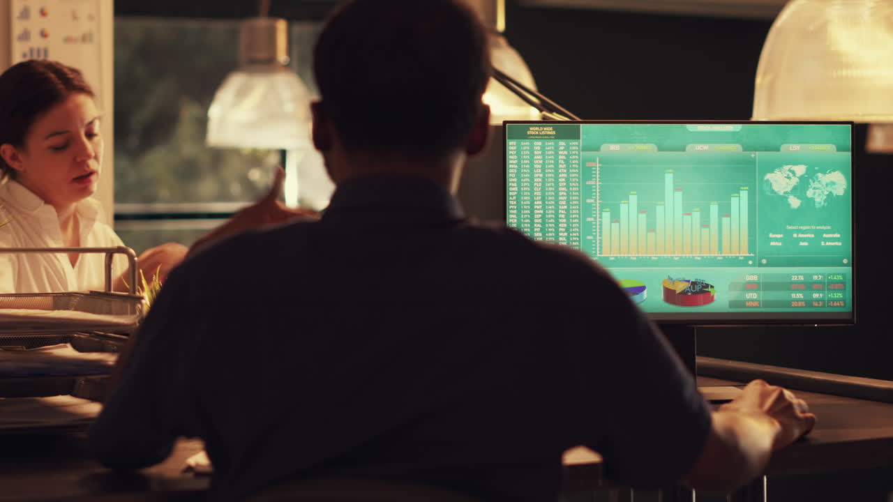 Diverse coworkers analyzing executive data and marketing shares