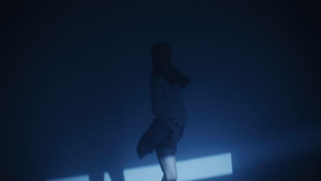woman dancing in a studio setting