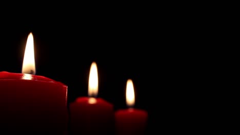 Burning-Candles-Black-Background