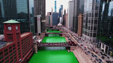 push in amazing chicago aerial between buildings downtown during the st