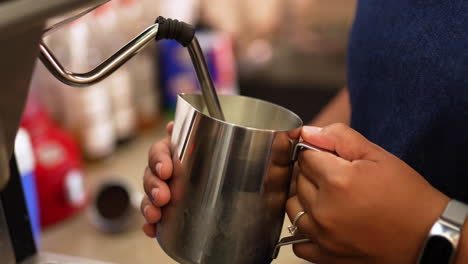 waitress making coffee