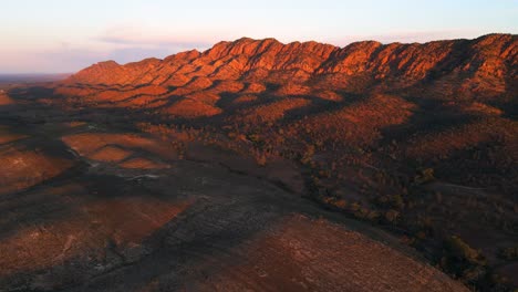 flying towards elders range mountains during magical sunset lights