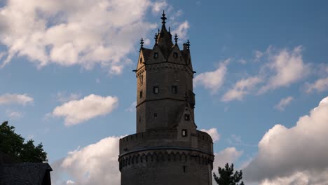 clouds rolling over the andernach round tower in germany -time lapse