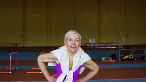 senior woman warming up indoors