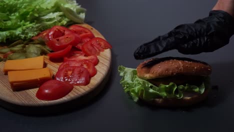 Hand-Done-Preparing-Nutritious-And-Healthy-Burger-With-Fresh-Vegetables