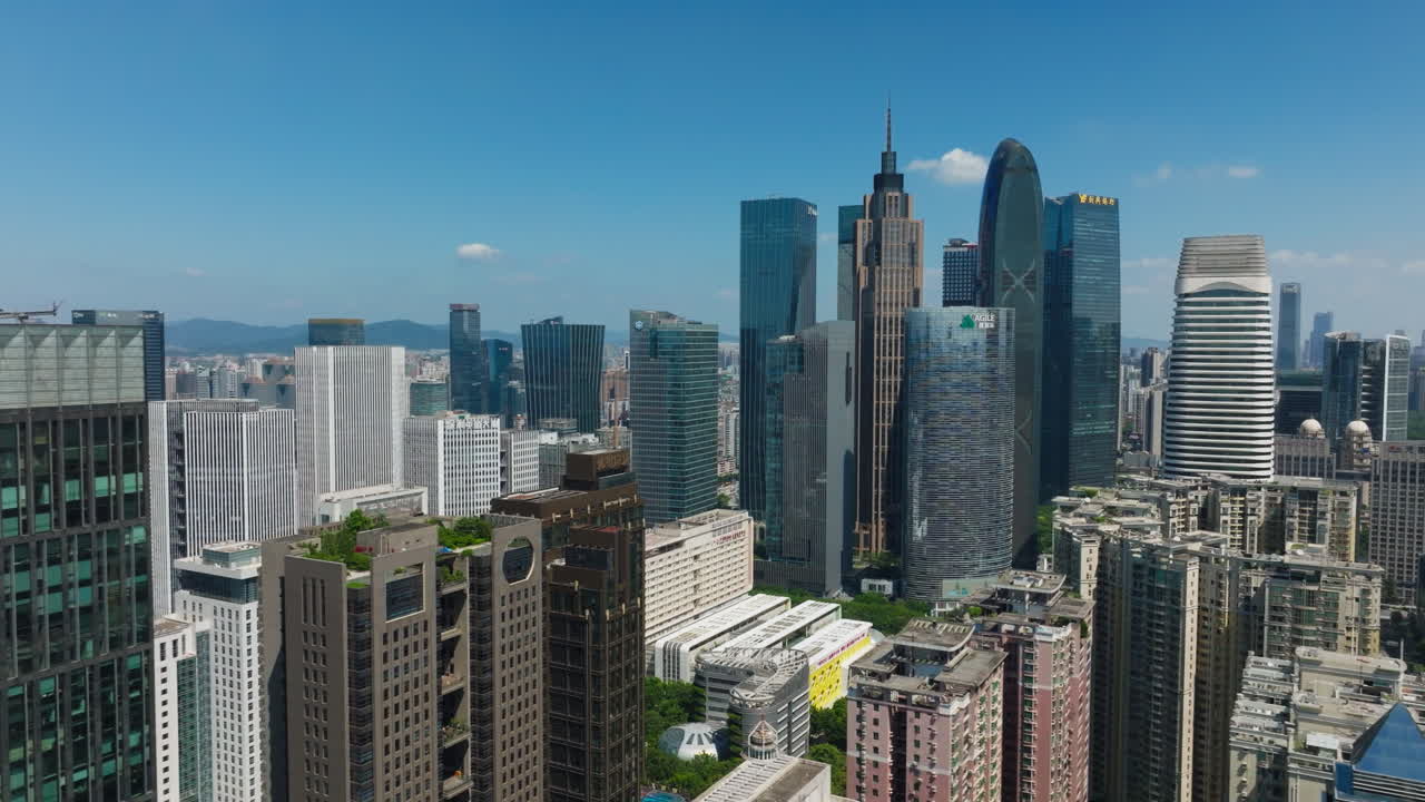 Downtown guangzhou, china with skyscrapers and blue sky on a sunny day , aerial view
