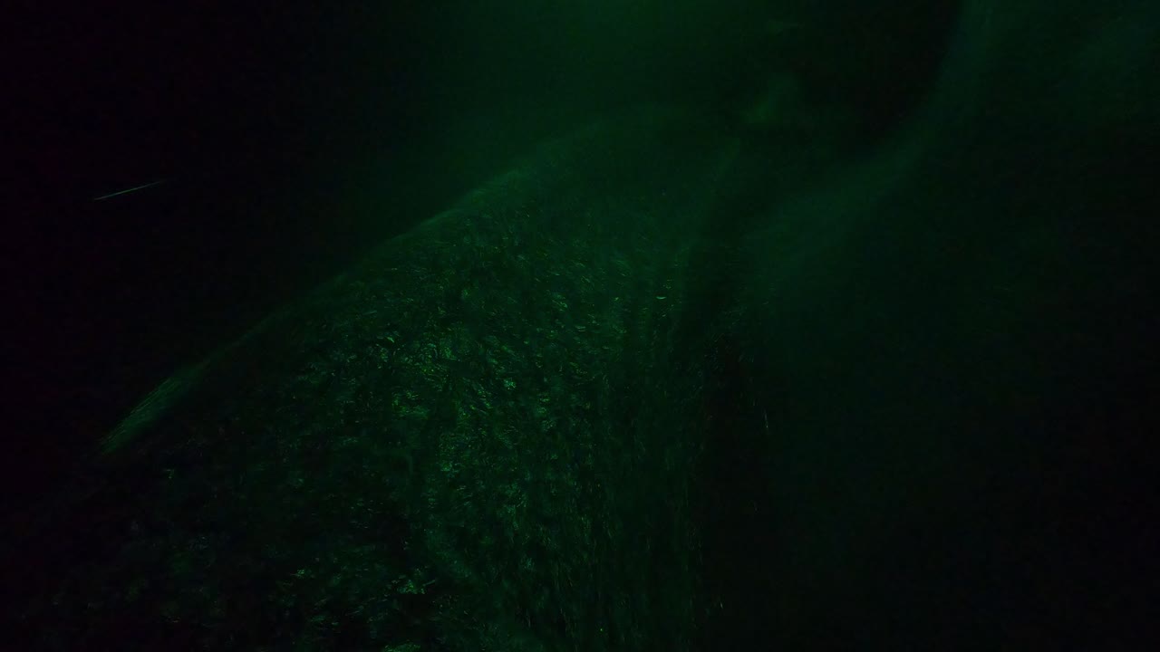 Driving through an indoor water slide in an aqua park