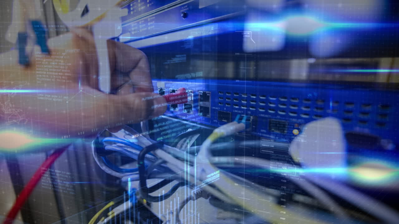 Animation of data processing over hand of caucasian man connecting wires in server