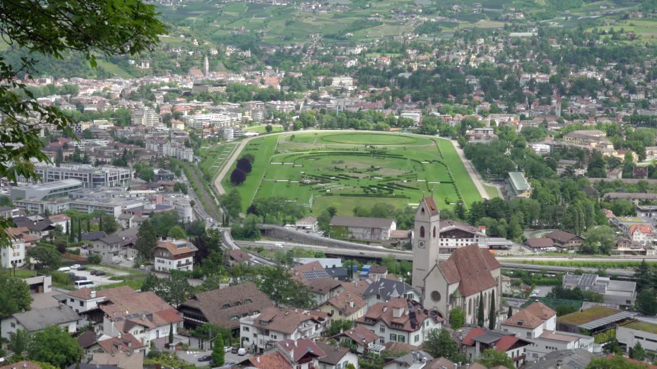 View of Marling - Marlengo and Meran - Merano and its horse racing track in South Tyrol, Italy from a higher viewpoint.