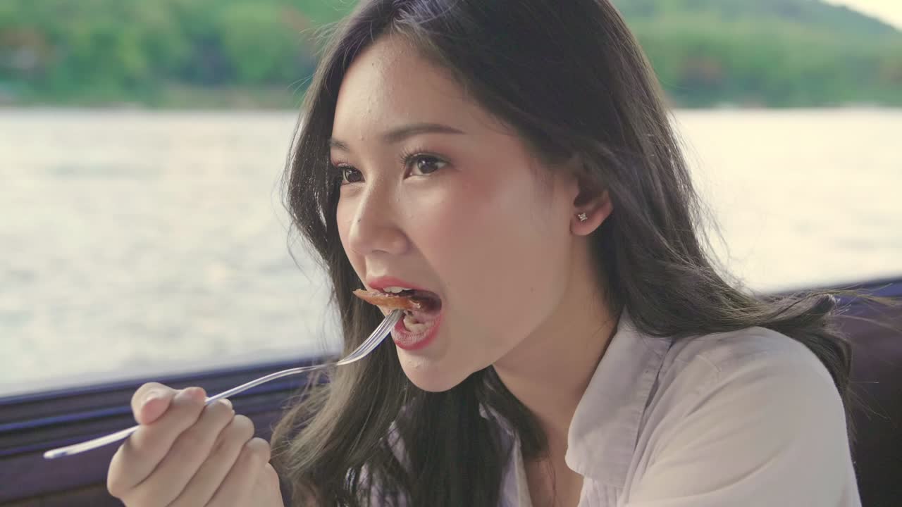 Beautiful Asian Woman Eating Food,Slow Motion