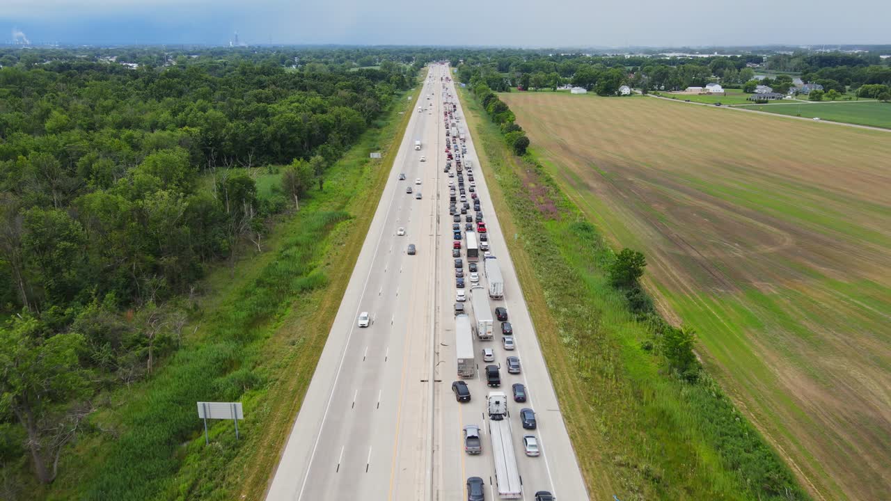 Long traffic jam stretches along I75 freeway through rural Michigan countryside