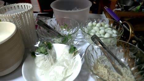 Looking-at-the-soup-and-the-ingredients-at-the-night-market-in-Bangkok