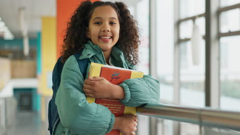 a girl with books at school