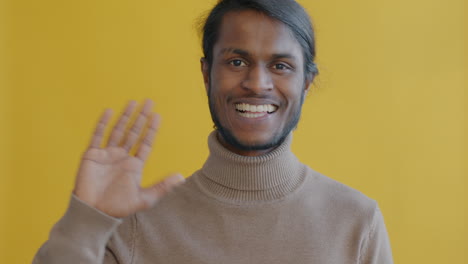 man waving hello