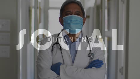 animation of social distancing text over male doctor wearing face mask