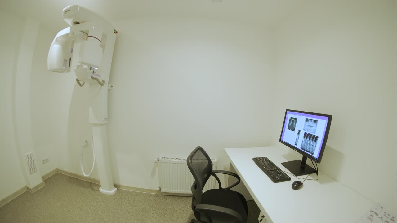 Modern dental practice. Dental chair and other accessories used by dentists in blue, medic light