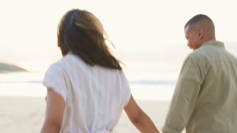 happy, love and holding hands with couple on beach