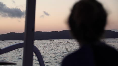 serene view  of sunrise over the island in gerupuk indonesia - medium shot