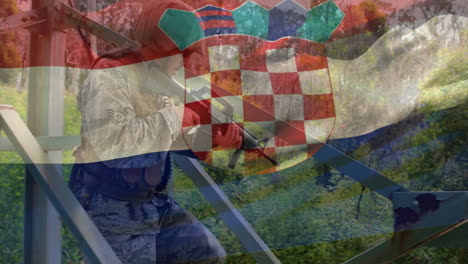 animación de la bandera de croacia sobre un soldado caucásico con un rifle