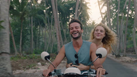 travel couple riding scooter on tropical island enjoying romantic ride exploring beautiful travel destination on motorcycle adventure