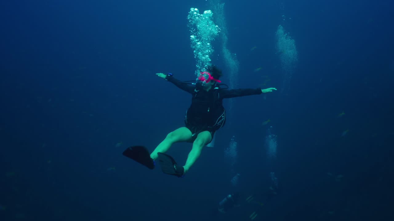 Scuba Diver in Deep Blue Water