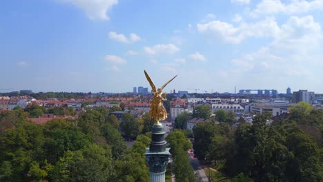 Beautiful-aerial-top-view-flight-Gold-Angel-of-Peace-column-City-town-Munich-Germany-Bavarian,-summer-sunny-cloudy-sky-day-23