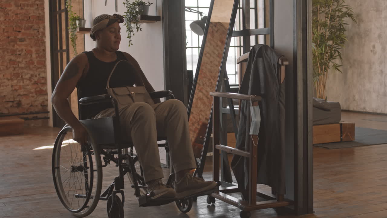 Woman with Disability Putting on Medical Mask