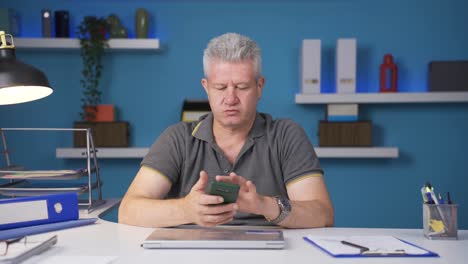 home office worker man having problems and stress on the phone.