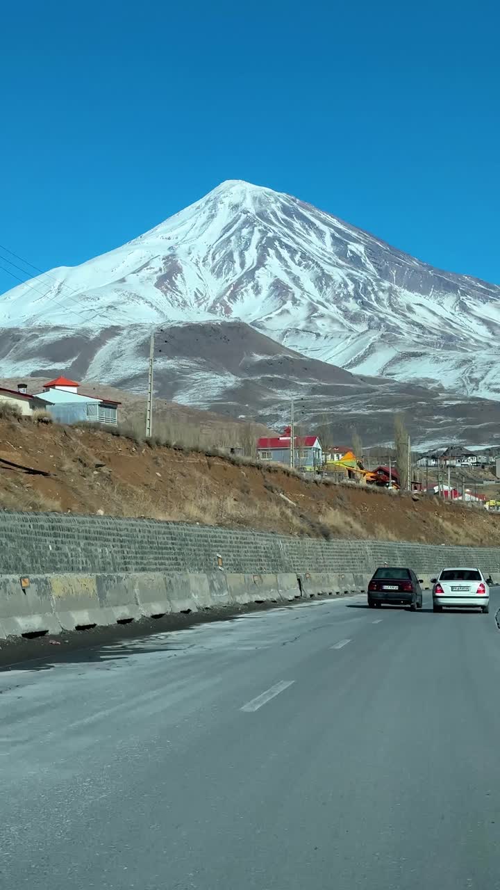 Winter season Damavand mountain road volcano peak trip adventure alpine car countryside drive forest highway Iran landscape nature outdoor pass people ride scenic sky snow tourism travel valley
