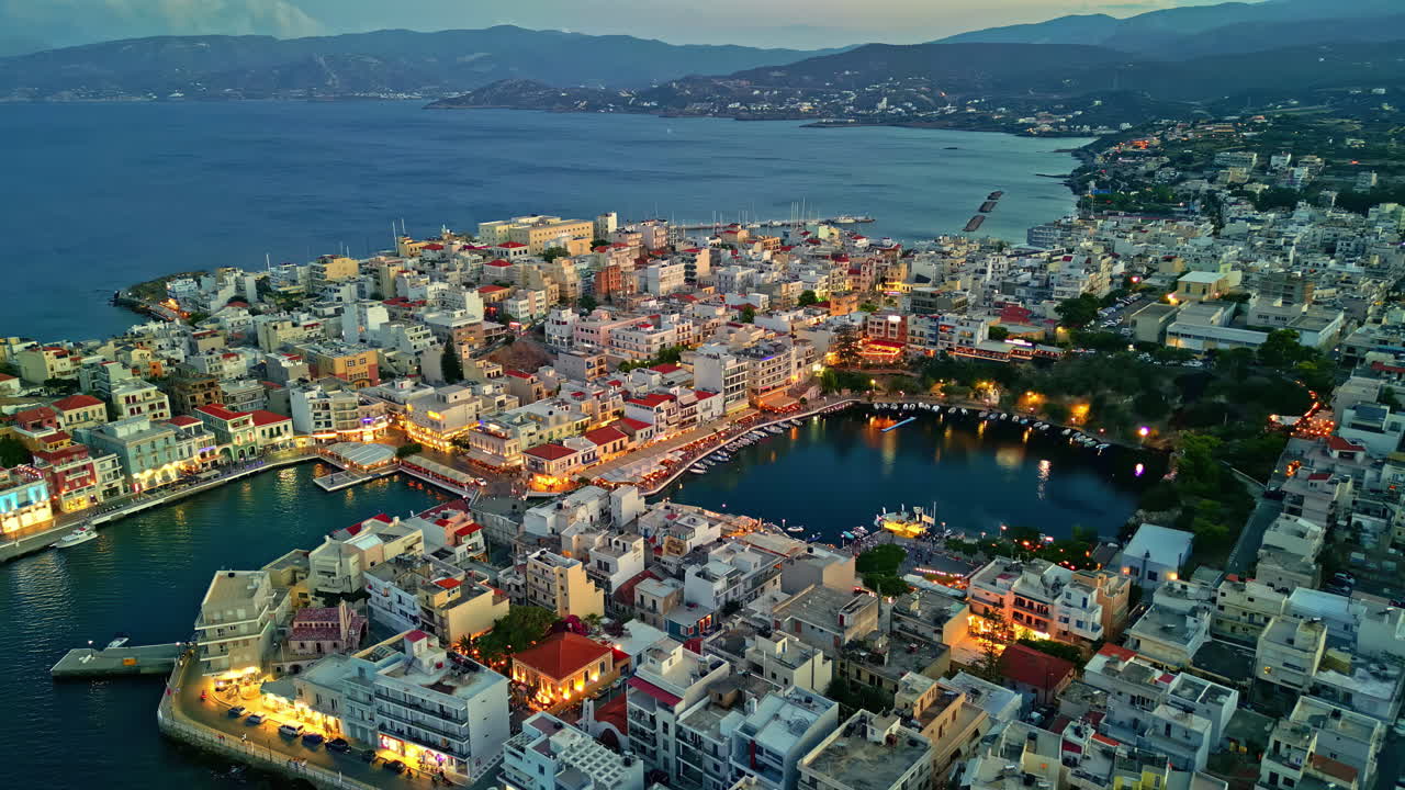 Aerial View Of Lake Voulismeni And Agios Nikolaos City In Crete Island, Greece