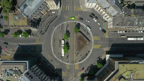 sunny day geneva city center traffic street circle aerial topdown panorama 4k switzerland