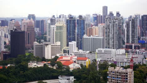 Luftaufnahme-Der-Gebäude-Der-Stadt-Singapur,-Sonniger-Tag,