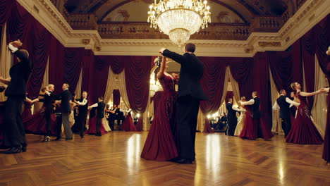 elegant couples waltzing in a grand ballroom