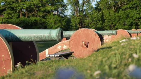 cannons at akershus fortress in oslo, slow right pan on a sunny day