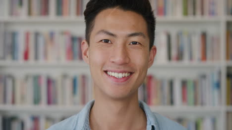 portrait intelligent young asian man student smiling enjoying success looking happy confident male slow motion