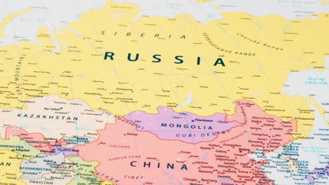 Close-up-of-the-country-word-Russia-on-a-world-map-with-the-detailed-name-of-the-capital-city