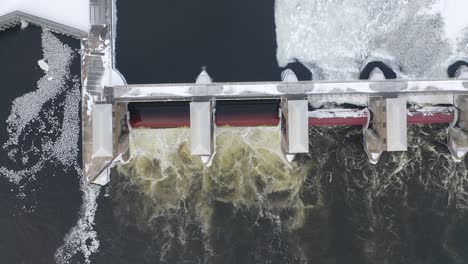 aerial view of a dam in winter
