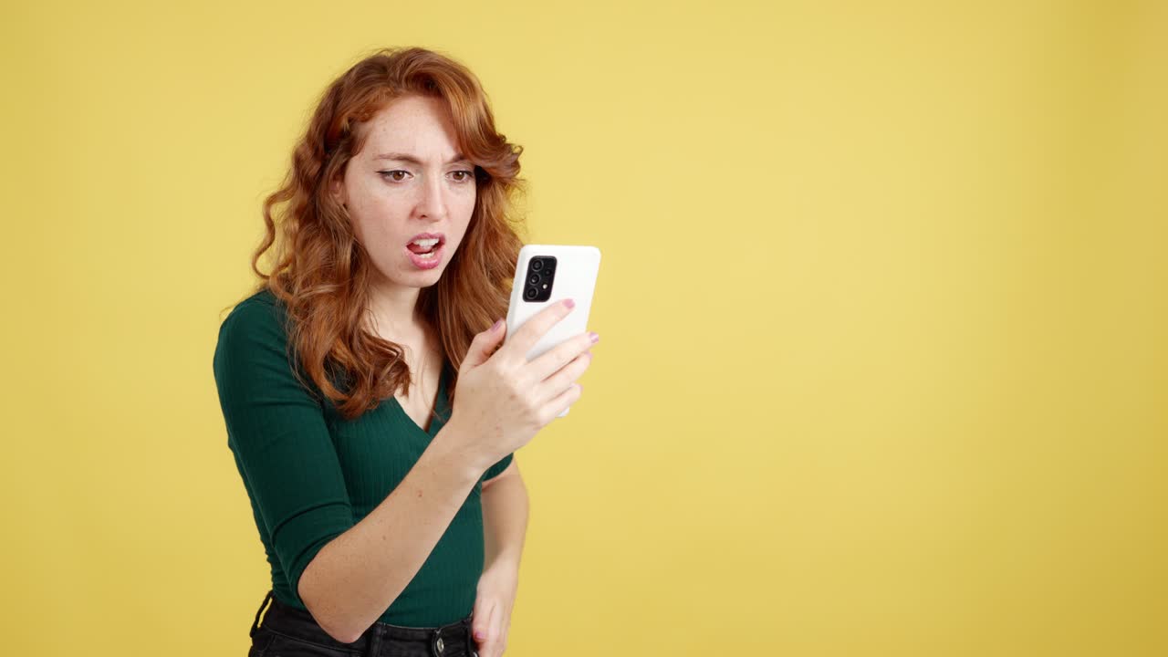 Woman Reacting with Shock and Disgust to Content on Her Phone