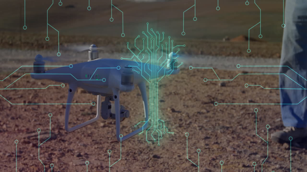 drone operator using hovering quadcopter on field showing tech overlay forming green circuit tree