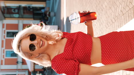 stylish woman in a red polka dot outfit