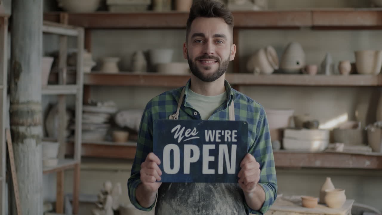 Craftsman in Pottery Studio - Open for Business