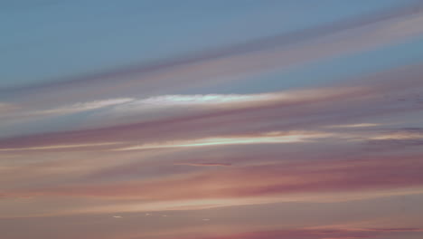 time lapse of beautiful scenic sunset with clouds and blue sky, wide shot